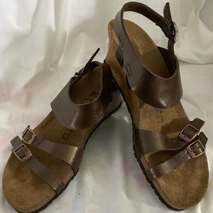 Bronze wedge sandals by Papillio.